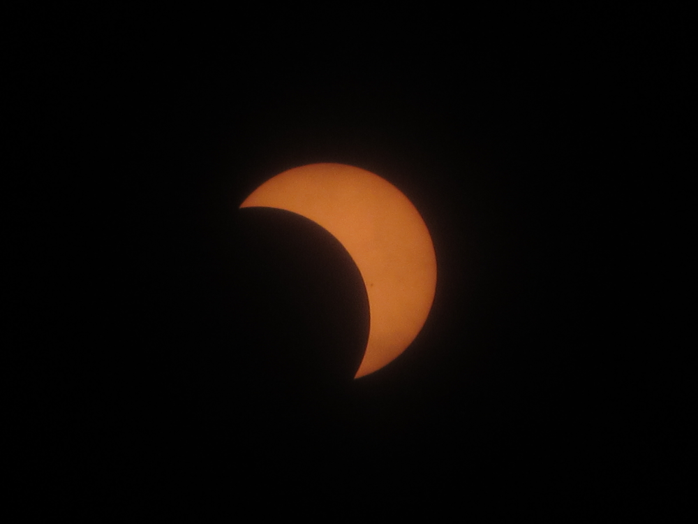 Eclipse with solar glasses filter (zoom 54x)